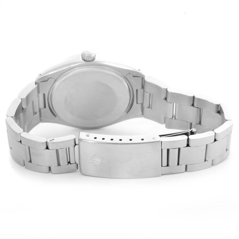 The image shows the back view of a Rolex Vintage Collection 5500 Men's Stainless Steel Silver Dial 5500 Men's Stainless Steel Silver Dial watch, displaying its case back, bracelet, and clasp.