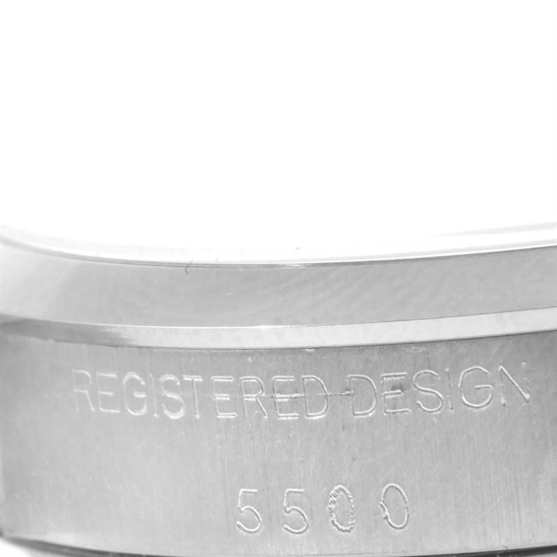This image shows a close-up of the engraved side of the Rolex Vintage Collection 5500 Men's Stainless Steel Silver Dial 5500 Men's Stainless Steel Silver Dial model, displaying "REGISTERED DESIGN" and "5500."
