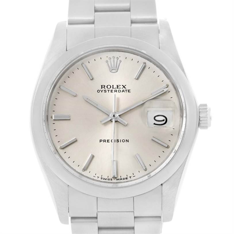 The image shows a front view of the Rolex Vintage Collection 6694 Men's Stainless Steel Silver Dial 6694 Men's Stainless Steel Silver Dial Oysterdate watch, highlighting its dial, hands, crown, and bracelet.