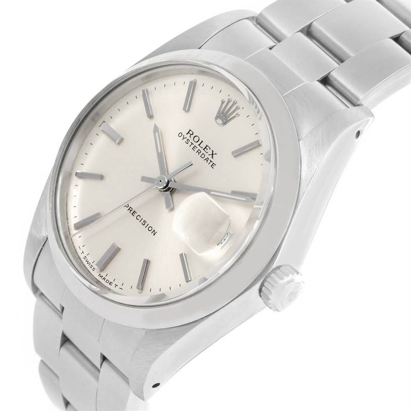 The image shows a close-up angle of the Rolex Vintage Collection 6694 Men's Stainless Steel Silver Dial 6694 Men's Stainless Steel Silver Dial Oysterdate watch, focusing on the dial, crown, and bracelet.