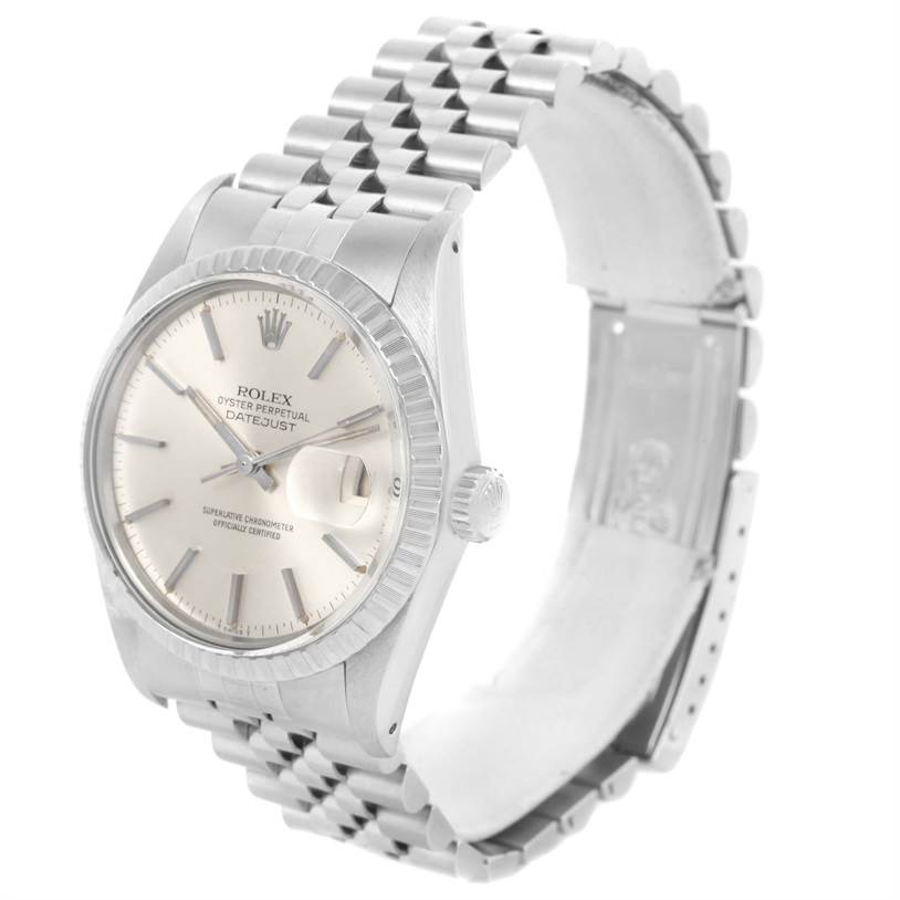 The image shows a Vintage Collection Rolex Datejust watch at a three-quarter angle, displaying the face, crown, and metal bracelet.