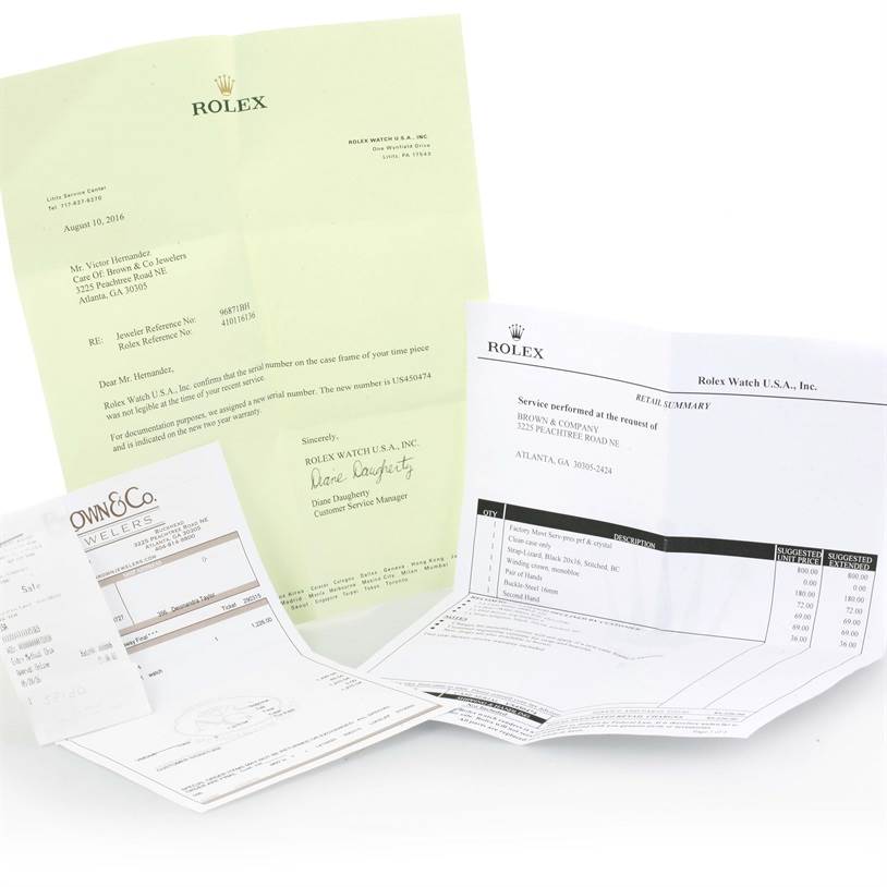 The image shows various documents and receipts for a Vintage Collection Rolex watch, including service and purchase papers.