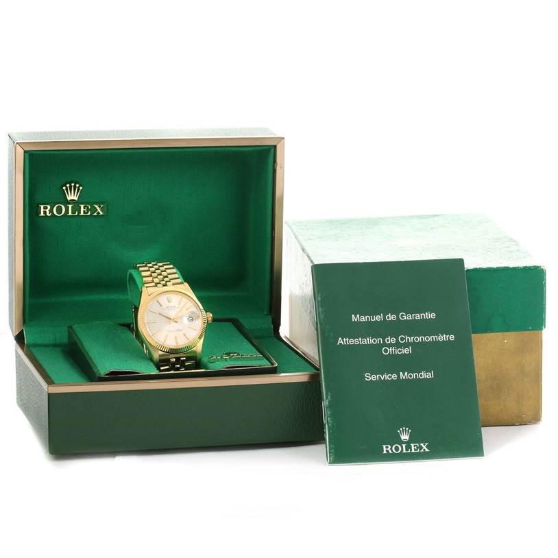 The image shows a Rolex Vintage Collection 1503 Men's Yellow Gold Silver Dial 1503 Men's Yellow Gold Silver Dial watch in its green case with accompanying documents and outer box.