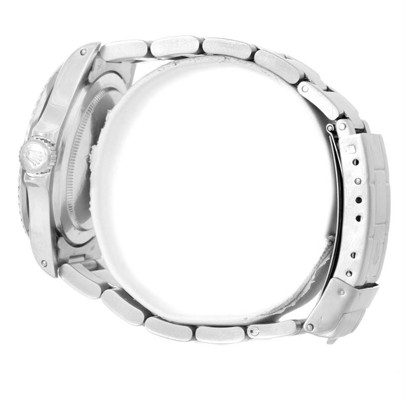 Side view of the Rolex Vintage Collection 5513 Men's Stainless Steel Black Dial 5513 Men's Stainless Steel Black Dial watch, showing the crown, casing, and metal bracelet with clasp.