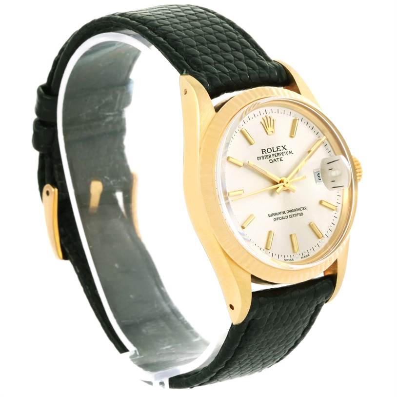 The Rolex Vintage Collection 15037 Men's Yellow Gold Silver Dial 15037 Men's Yellow Gold Silver Dial model is shown at a three-quarter angle, displaying its round dial, gold case, and black leather strap.
