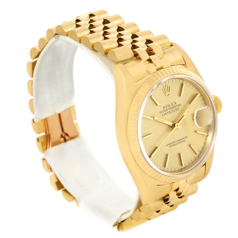 The watch is angled to show the face, crown, and bracelet of the Rolex Vintage Collection 16018 Men's Yellow Gold Champagne Dial 16018 Men's Yellow Gold Champagne Dial model.