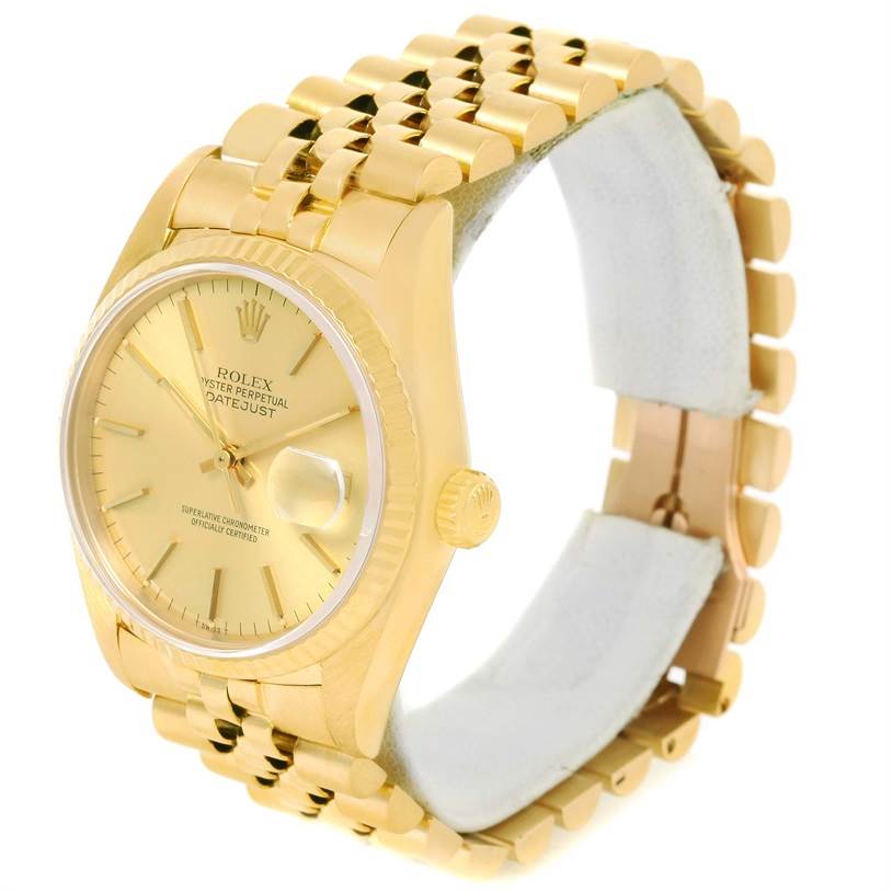 The image shows a side and partial top view of the Rolex Vintage Collection 16018 Men's Yellow Gold Champagne Dial 16018 Men's Yellow Gold Champagne Dial model watch, showcasing its gold case, dial, and bracelet.