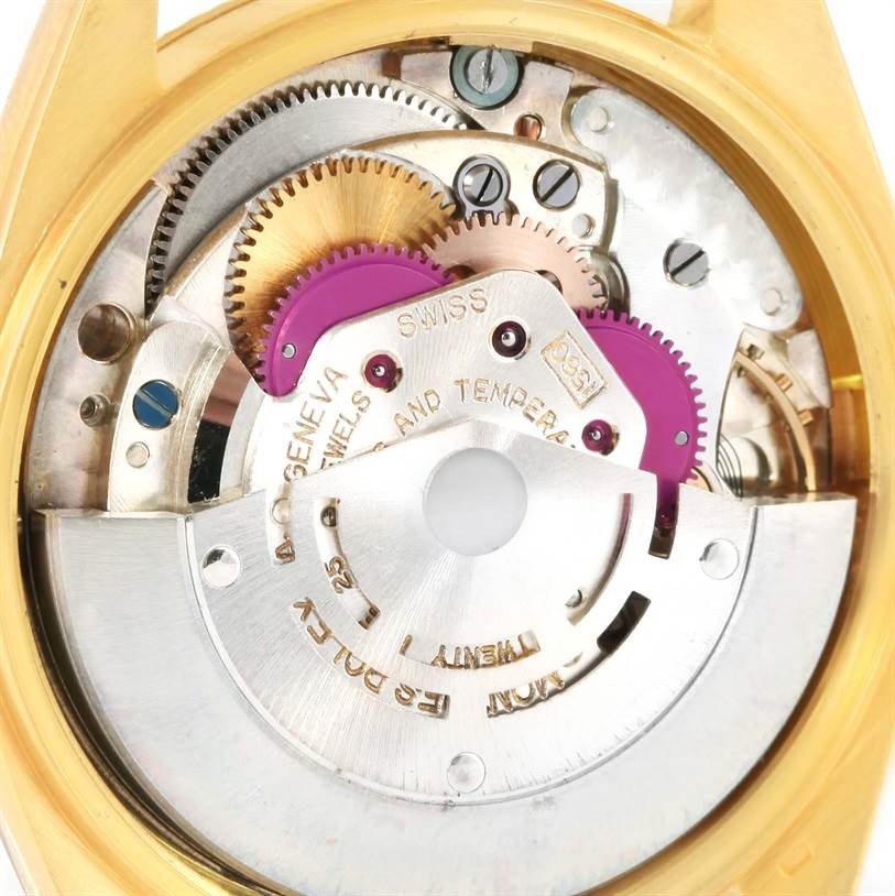This image shows the internal movement and gears of the Vintage Collection Rolex watch from a back angle.