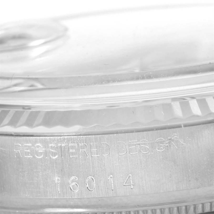Close-up of the case and bezel of a Rolex Vintage Collection 16014 Men's Stainless Steel Silver Dial 16014 Men's Stainless Steel Silver Dial model, showing the engraved serial number "16014."