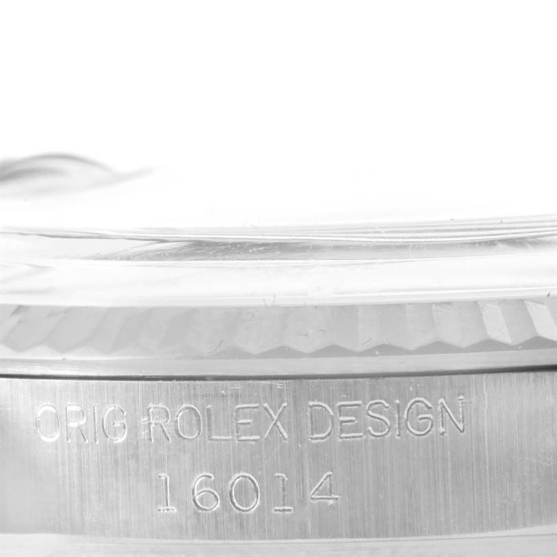 The image shows a close-up of the edge and reference number '16014' of a Rolex Vintage Collection 16014 Men's Stainless Steel Silver Dial 16014 Men's Stainless Steel Silver Dial watch case.