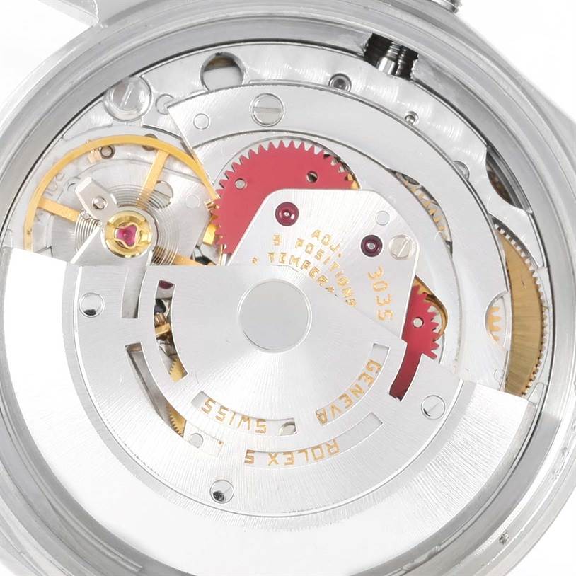 This image shows the intricate inner mechanism of a Rolex Vintage Collection 16014 Men's Stainless Steel Silver Dial 16014 Men's Stainless Steel Silver Dial model watch from a close-up angle.