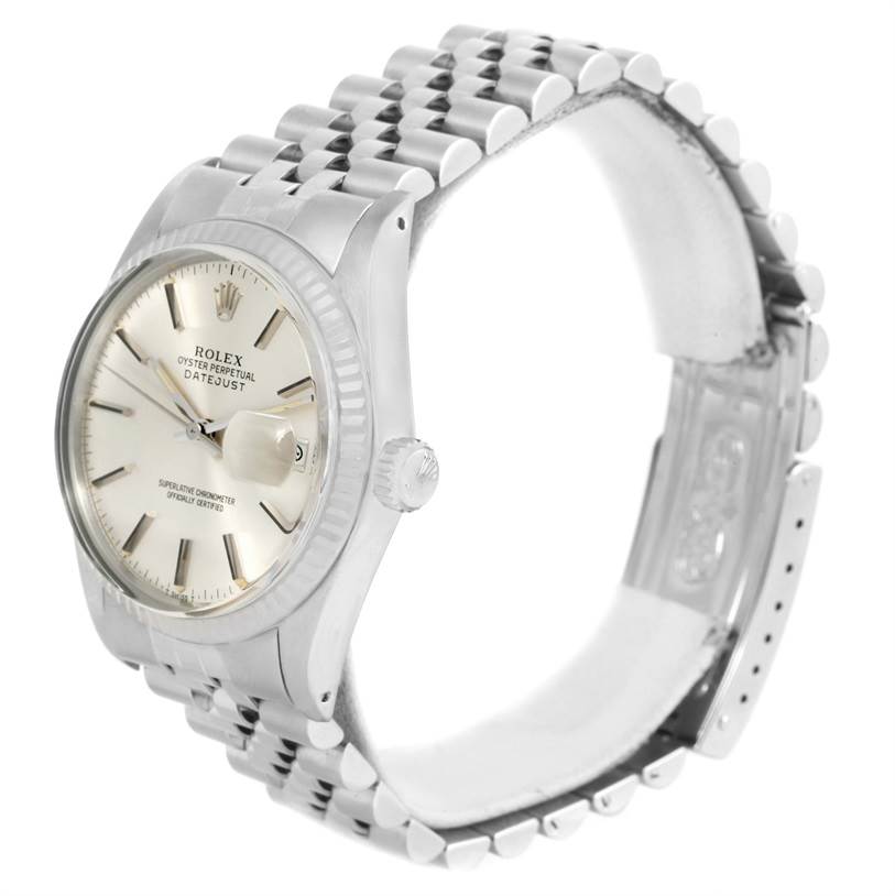 The image shows a side-angle view of the Rolex Vintage Collection 16014 Men's Stainless Steel Silver Dial 16014 Men's Stainless Steel Silver Dial watch, highlighting the face, bezel, crown, and part of the bracelet.