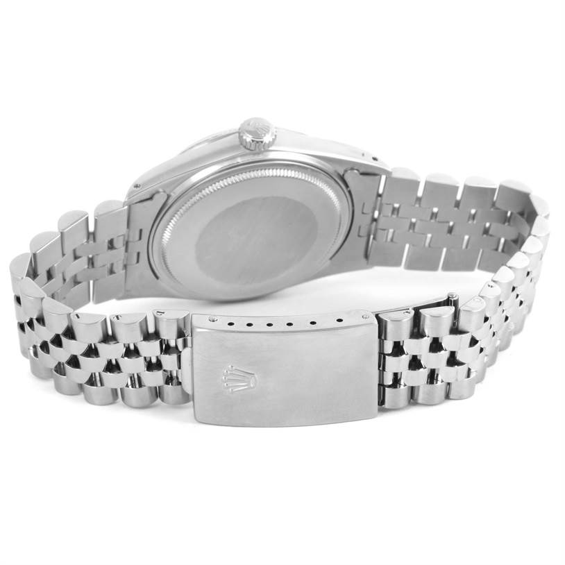 The image shows the back view of a Rolex Vintage Collection 16014 Men's Stainless Steel Silver Dial 16014 Men's Stainless Steel Silver Dial watch, featuring its case and bracelet.