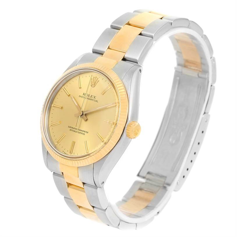The image shows a Rolex Vintage Collection 1005 Men's Steel and Gold (two tone) Champagne Dial 1005 Men's Steel and Gold (two tone) Champagne Dial model watch at a three-quarter angle, highlighting its two-tone bracelet, dial, and bezel.