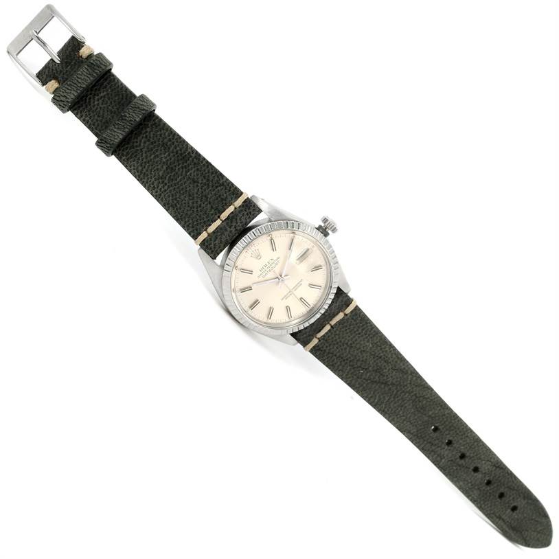 The image displays a top-down view of a Rolex Vintage Collection 16030 Men's Stainless Steel Silver Dial 16030 Men's Stainless Steel Silver Dial watch, showing the face and the full strap.