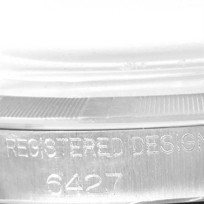 The image shows a close-up of the case side of a Rolex Vintage Collection 6427 Men's Stainless Steel Silver Dial 6427 Men's Stainless Steel Silver Dial watch, highlighting the model number "6427."