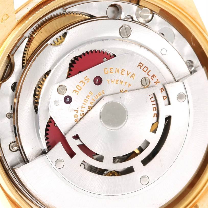 The image shows a close-up of the internal mechanism of a Rolex Vintage Collection 15037 Men's Yellow Gold Champagne Dial 15037 Men's Yellow Gold Champagne Dial model.