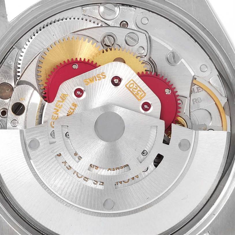 The image shows the internal mechanism of a Rolex Vintage Collection 5500 Men's Stainless Steel Silver Dial 5500 Men's Stainless Steel Silver Dial watch from a close-up, revealing gears and intricate components.