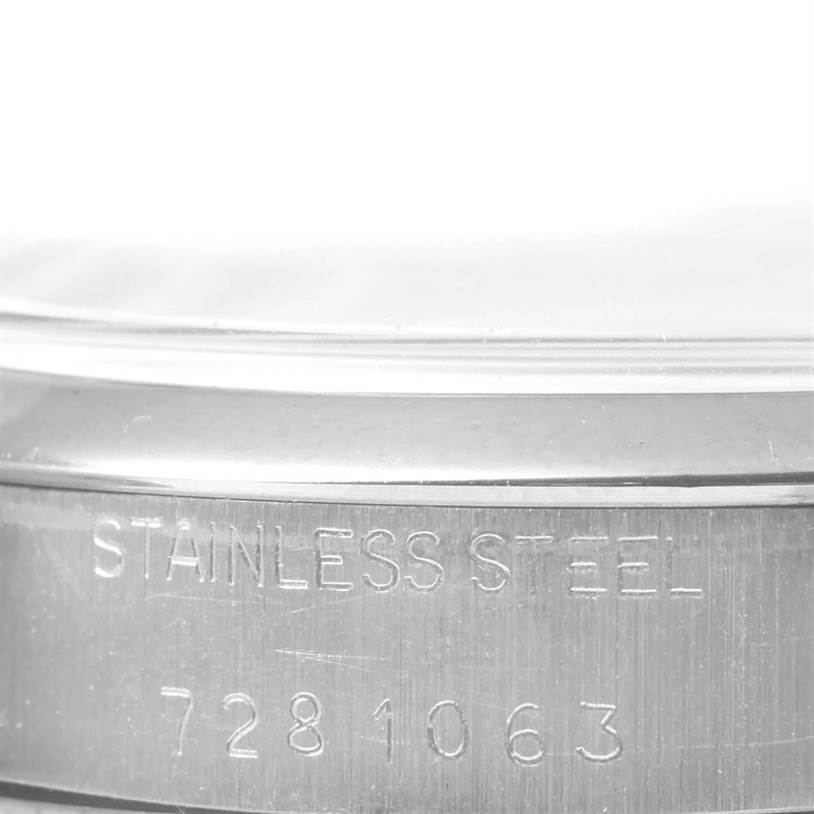 This image shows a close-up of the side case of a stainless steel Rolex Vintage Collection 5500 Men's Stainless Steel Silver Dial 5500 Men's Stainless Steel Silver Dial watch.