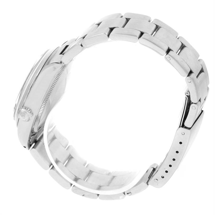 The image shows a side view of a Rolex Vintage Collection 5500 Men's Stainless Steel Silver Dial 5500 Men's Stainless Steel Silver Dial watch highlighting its case, crown, and bracelet.