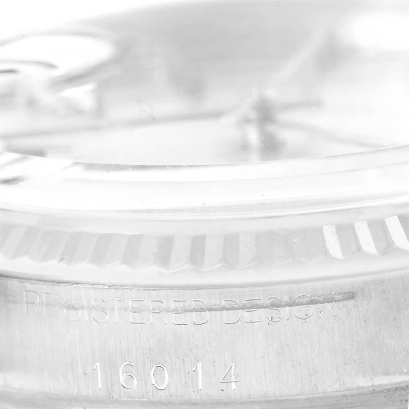 This close-up shows the case side and bezel of the Rolex Vintage Collection 16014 Men's Stainless Steel Silver Dial 16014 Men's Stainless Steel Silver Dial model, emphasizing the engraved model number.