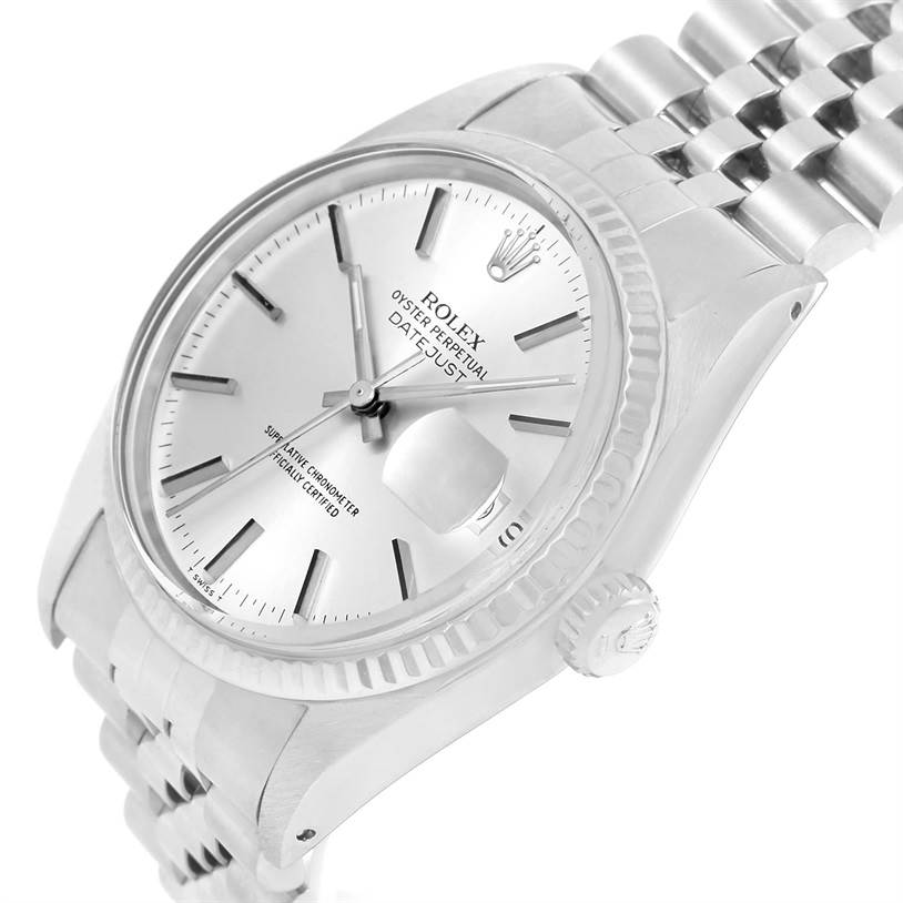 The image shows a side angle of the Rolex Vintage Collection 16014 Men's Stainless Steel Silver Dial 16014 Men's Stainless Steel Silver Dial Datejust, highlighting its face, crown, and bracelet.