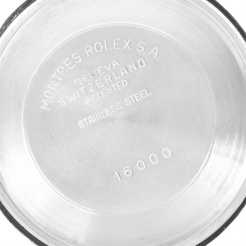 This image shows the interior of the case back for the Rolex Vintage Collection 16014 Men's Stainless Steel Silver Dial 16014 Men's Stainless Steel Silver Dial model 16000, marked with brand and model information.