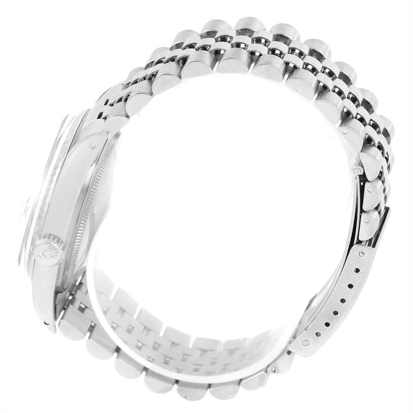 This image shows a side view of a Rolex Vintage Collection 16014 Men's Stainless Steel Silver Dial 16014 Men's Stainless Steel Silver Dial watch, highlighting its metal bracelet and side profile of the case.