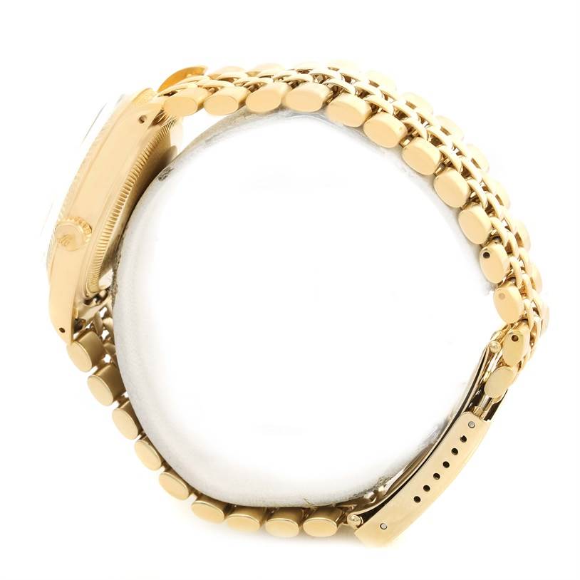 The image shows a side view of a Rolex Vintage Collection 1503 Men's Yellow Gold White Dial 1503 Men's Yellow Gold White Dial watch, displaying its gold band, clasp, and case side with crown.