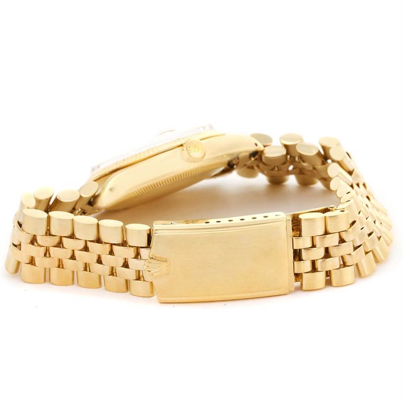 This image shows a side view of the Rolex Vintage Collection 1503 Men's Yellow Gold White Dial 1503 Men's Yellow Gold White Dial model, focusing on its gold bracelet and clasp.