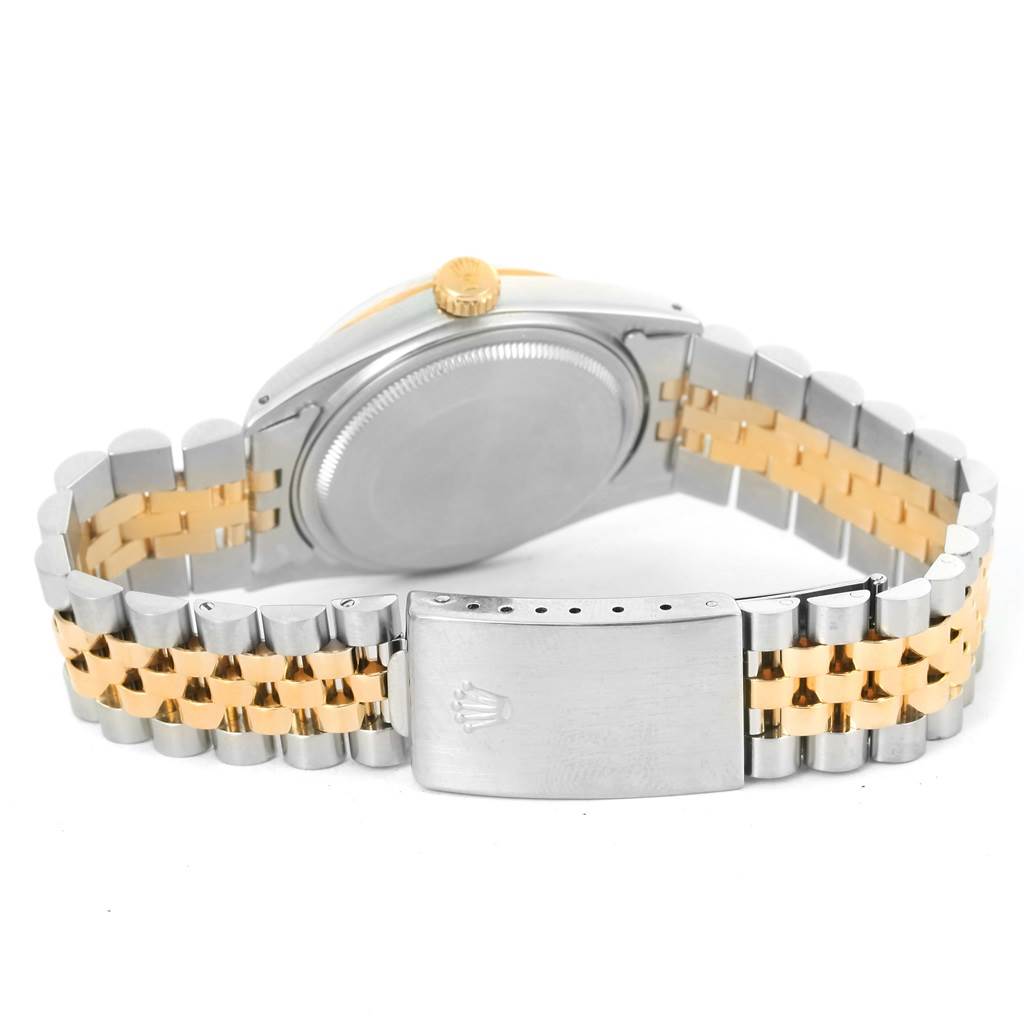 The image shows the backside of the Rolex Vintage Collection 16013 Men's Stainless Steel White Dial 16013 Men's Stainless Steel White Dial watch, focusing on the case back, crown, and two-tone bracelet with the clasp.