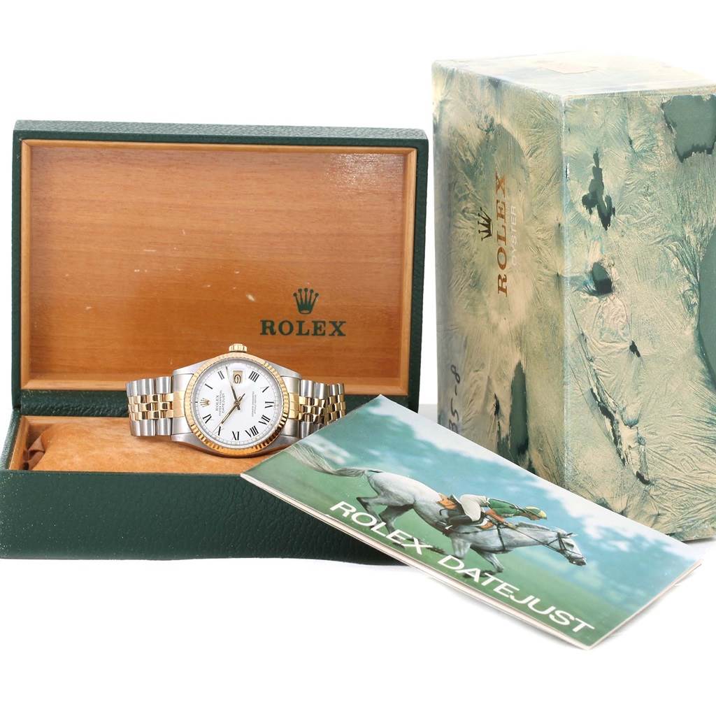 The image shows a Rolex Vintage Collection 16013 Men's Stainless Steel White Dial 16013 Men's Stainless Steel White Dial watch displayed front-facing inside its box, with an outer box and a manual nearby.
