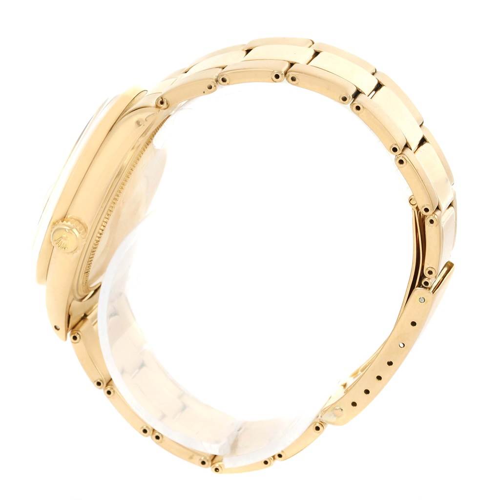 The image shows a side view of a Rolex Vintage Collection 1500 Men's Yellow Gold Champagne Dial 1500 Men's Yellow Gold Champagne Dial watch, highlighting the bracelet and crown.