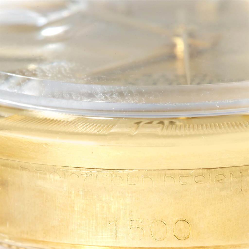 This close-up image shows the side view of the dial and bezel of the Vintage Collection Rolex watch model number 1500.