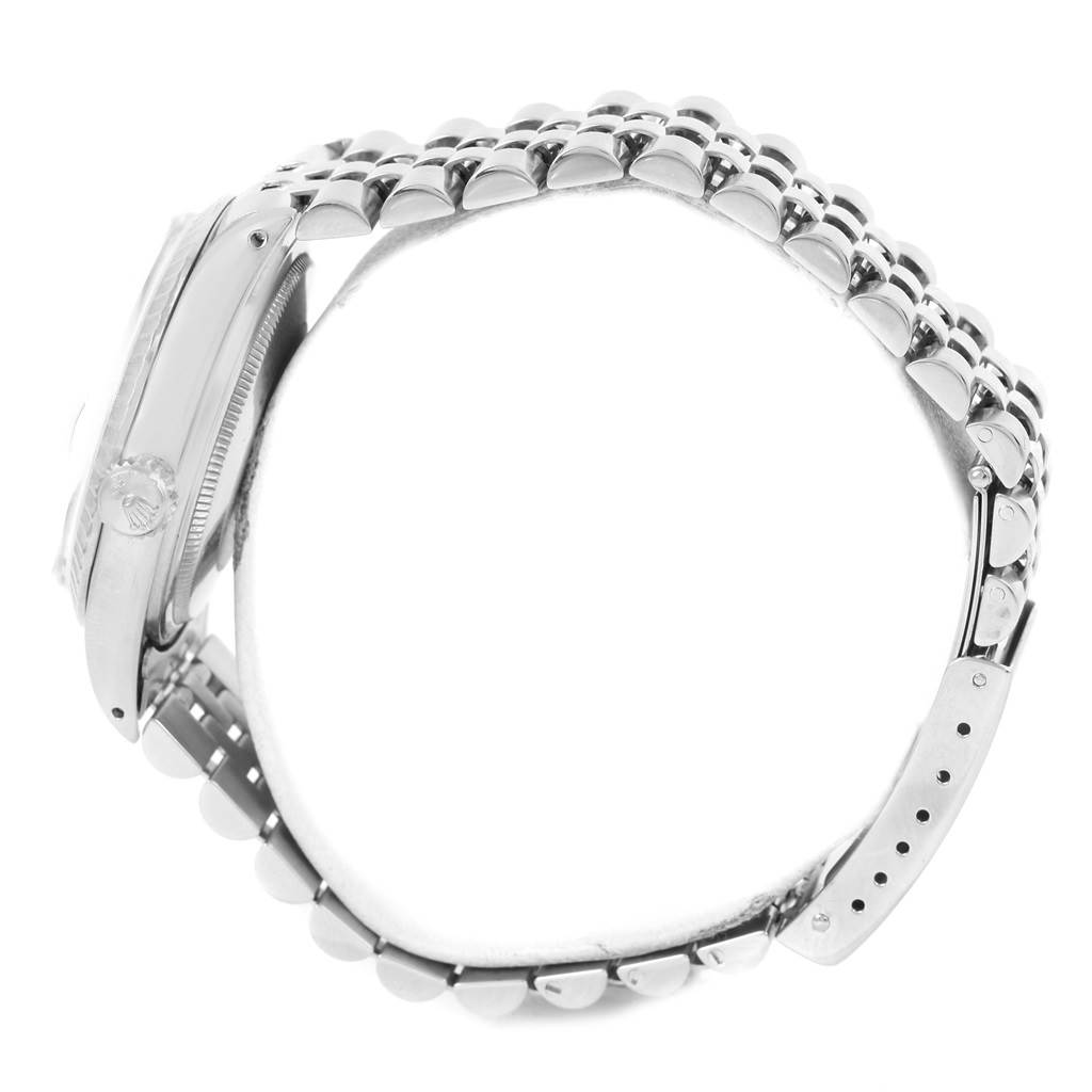 The image shows a side view of the Rolex Vintage Collection 16030 Men's Stainless Steel Silver Dial 16030 Men's Stainless Steel Silver Dial watch, highlighting the crown, case, and bracelet.