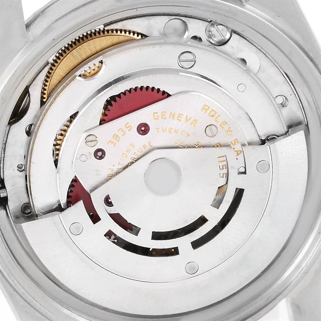 This image shows the internal mechanical movement of a Rolex Vintage Collection 16030 Men's Stainless Steel Silver Dial 16030 Men's Stainless Steel Silver Dial watch, viewed from the back with visible gears and components.