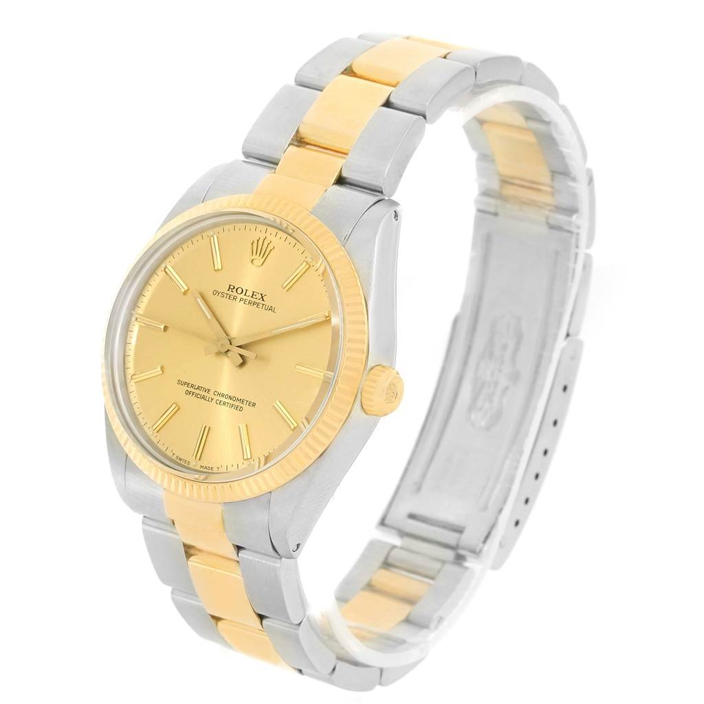 The Rolex Vintage Collection 1005 Men's Steel and Gold (two tone) Champagne Dial 1005 Men's Steel and Gold (two tone) Champagne Dial watch is shown at a diagonal angle highlighting the face and two-tone band.