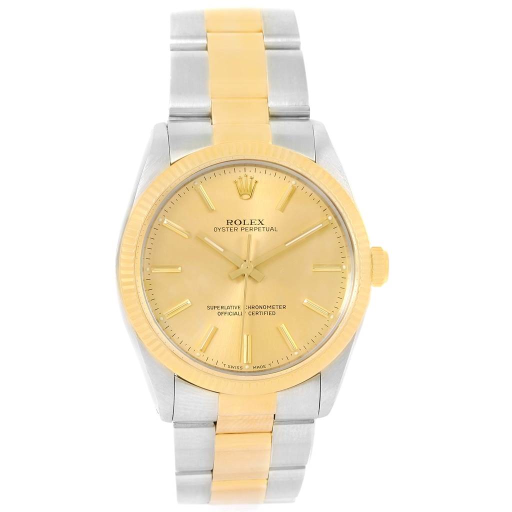 The image shows a front view of a Rolex Vintage Collection 1005 Men's Steel and Gold (two tone) Champagne Dial 1005 Men's Steel and Gold (two tone) Champagne Dial Oyster Perpetual watch featuring a dual-tone metal strap and gold dial.