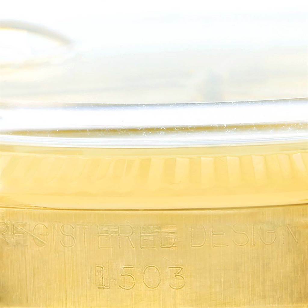 The image shows a close-up of the side of a Rolex Vintage Collection 1503 Men's Yellow Gold Champagne Dial 1503 Men's Yellow Gold Champagne Dial model 1503, highlighting the bezel and engraved serial number.
