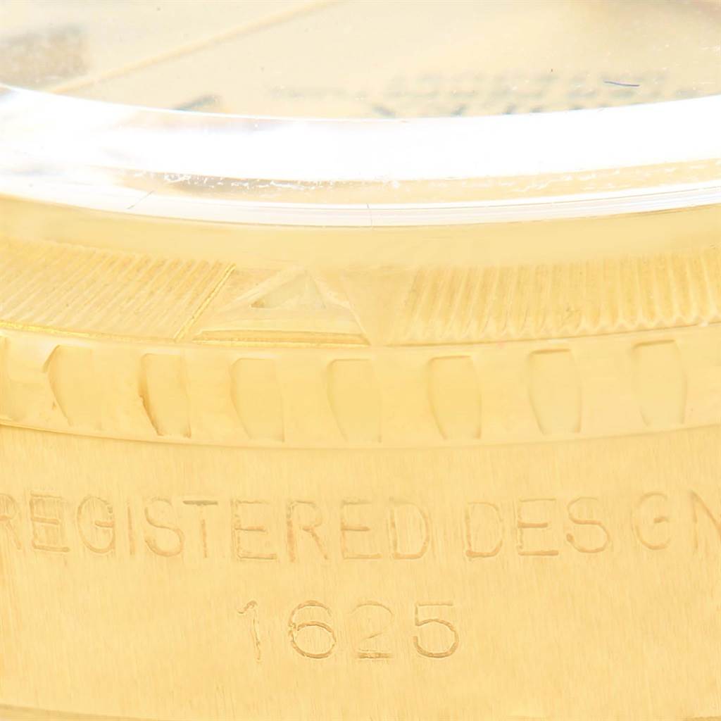This close-up image shows the side of a Rolex Vintage Collection 1625 Men's Yellow Gold Champagne Dial 1625 Men's Yellow Gold Champagne Dial watch, model number 1625, focusing on the bezel and case.