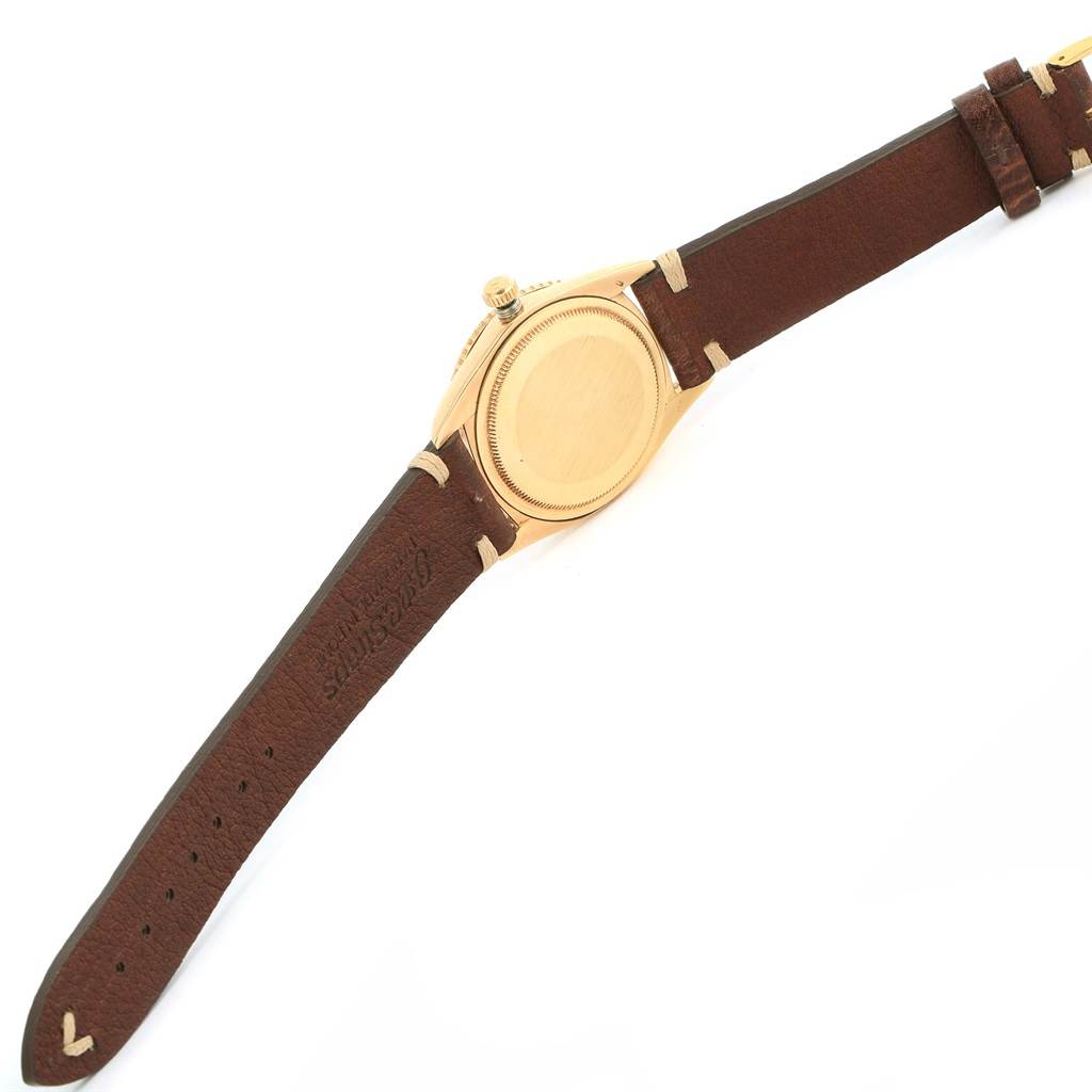 The image displays the back case and brown leather strap of the Rolex Vintage Collection 1625 Men's Yellow Gold Champagne Dial 1625 Men's Yellow Gold Champagne Dial watch, viewed from the rear.