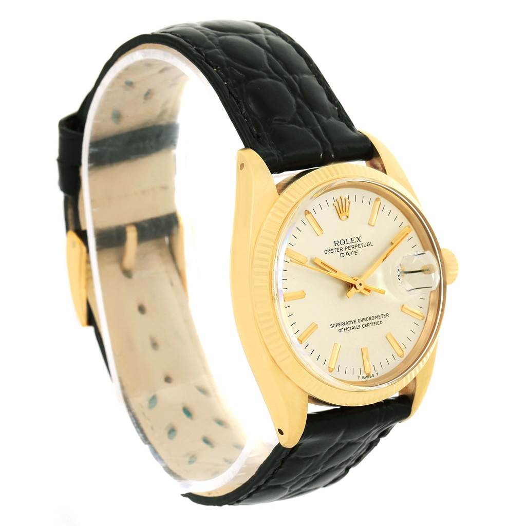 The image shows a side angle of the Rolex Vintage Collection 1503 Men's Yellow Gold Silver Dial 1503 Men's Yellow Gold Silver Dial watch, highlighting its face, bezel, crown, and leather strap.
