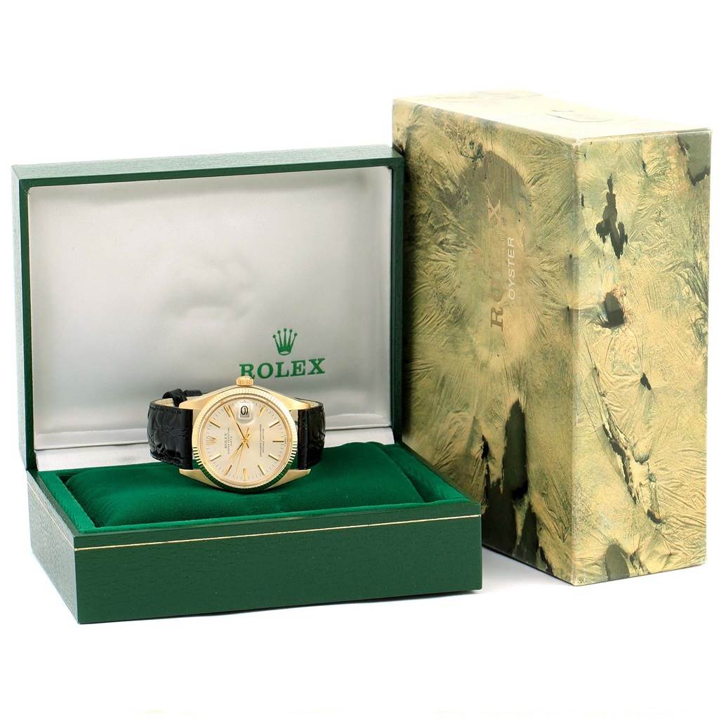The image shows a Rolex Vintage Collection 1503 Men's Yellow Gold Silver Dial 1503 Men's Yellow Gold Silver Dial watch displayed in an open case with a decorative outer box beside it.