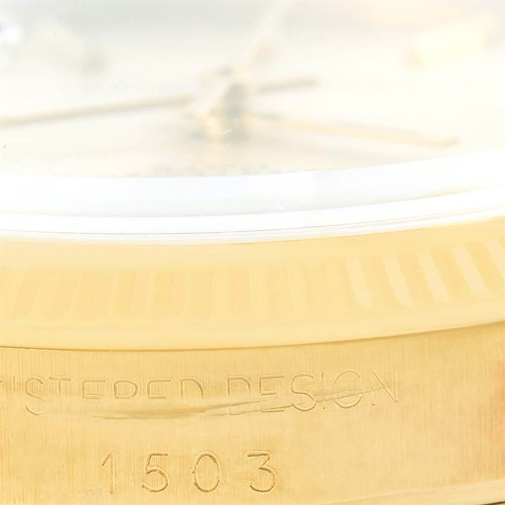 The image shows a close-up of the side of a Rolex Vintage Collection 1503 Men's Yellow Gold Silver Dial 1503 Men's Yellow Gold Silver Dial model, displaying the edge of the dial and model number 1503.