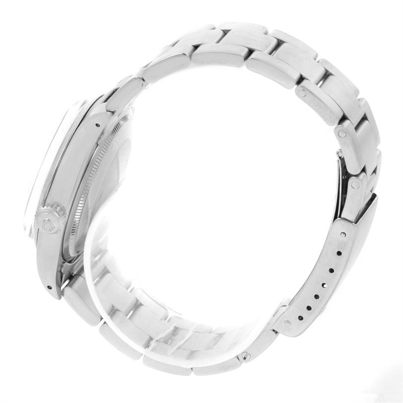 This image shows the side profile of the Rolex Vintage Collection 1500 Men's Stainless Steel Silver Dial 1500 Men's Stainless Steel Silver Dial watch, highlighting the bracelet, crown, and clasp.