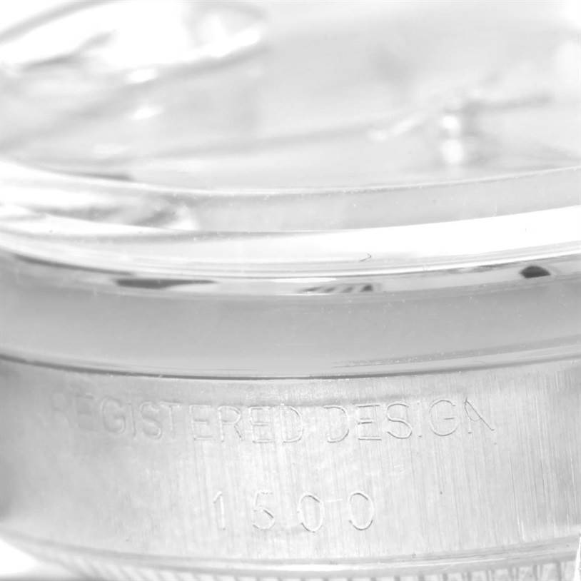 This close-up image shows the side of the Rolex Vintage Collection 1500 Men's Stainless Steel Silver Dial 1500 Men's Stainless Steel Silver Dial model, highlighting the engraved design number "1500."