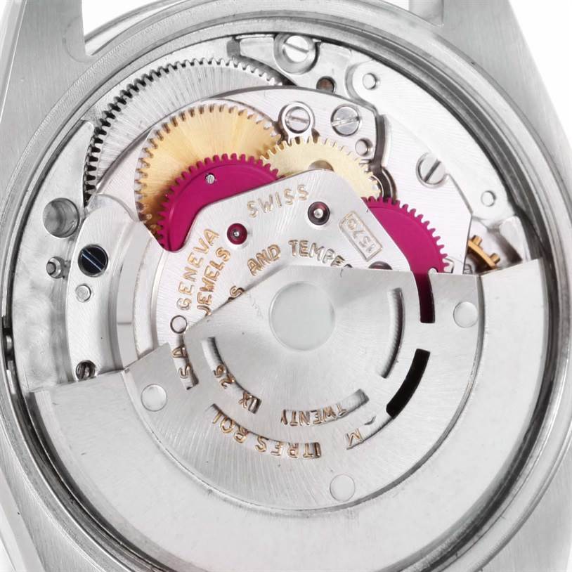 The image shows the inner mechanism of the Rolex Vintage Collection 1500 Men's Stainless Steel Silver Dial 1500 Men's Stainless Steel Silver Dial watch from a close-up, showcasing its gears and movement.