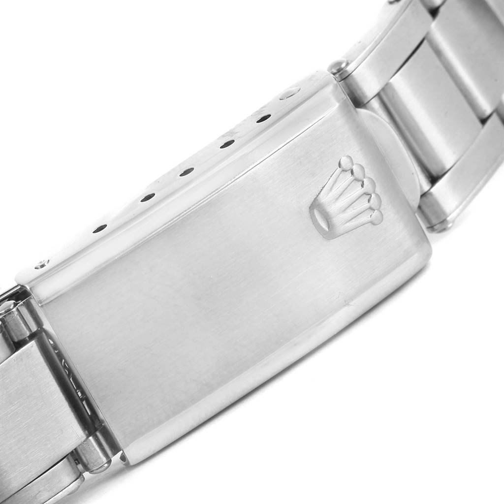 This image shows the clasp and part of the bracelet of a Rolex Vintage Collection 1501 Men's Stainless Steel Blue Dial 1501 Men's Stainless Steel Blue Dial watch.