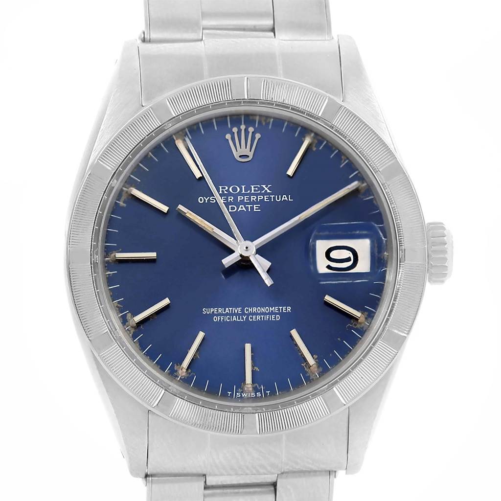 The image shows a front view of the Rolex Vintage Collection 1501 Men's Stainless Steel Blue Dial 1501 Men's Stainless Steel Blue Dial Oyster Perpetual Date watch, highlighting its blue dial, silver indices, and date display.