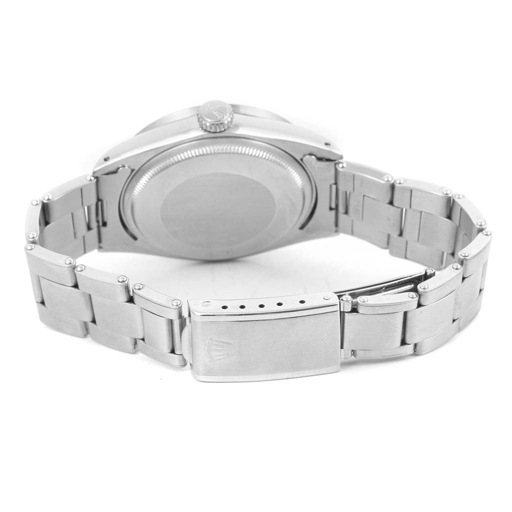 The image shows the back case and bracelet clasp of the Rolex Vintage Collection 1501 Men's Stainless Steel Blue Dial 1501 Men's Stainless Steel Blue Dial model watch.